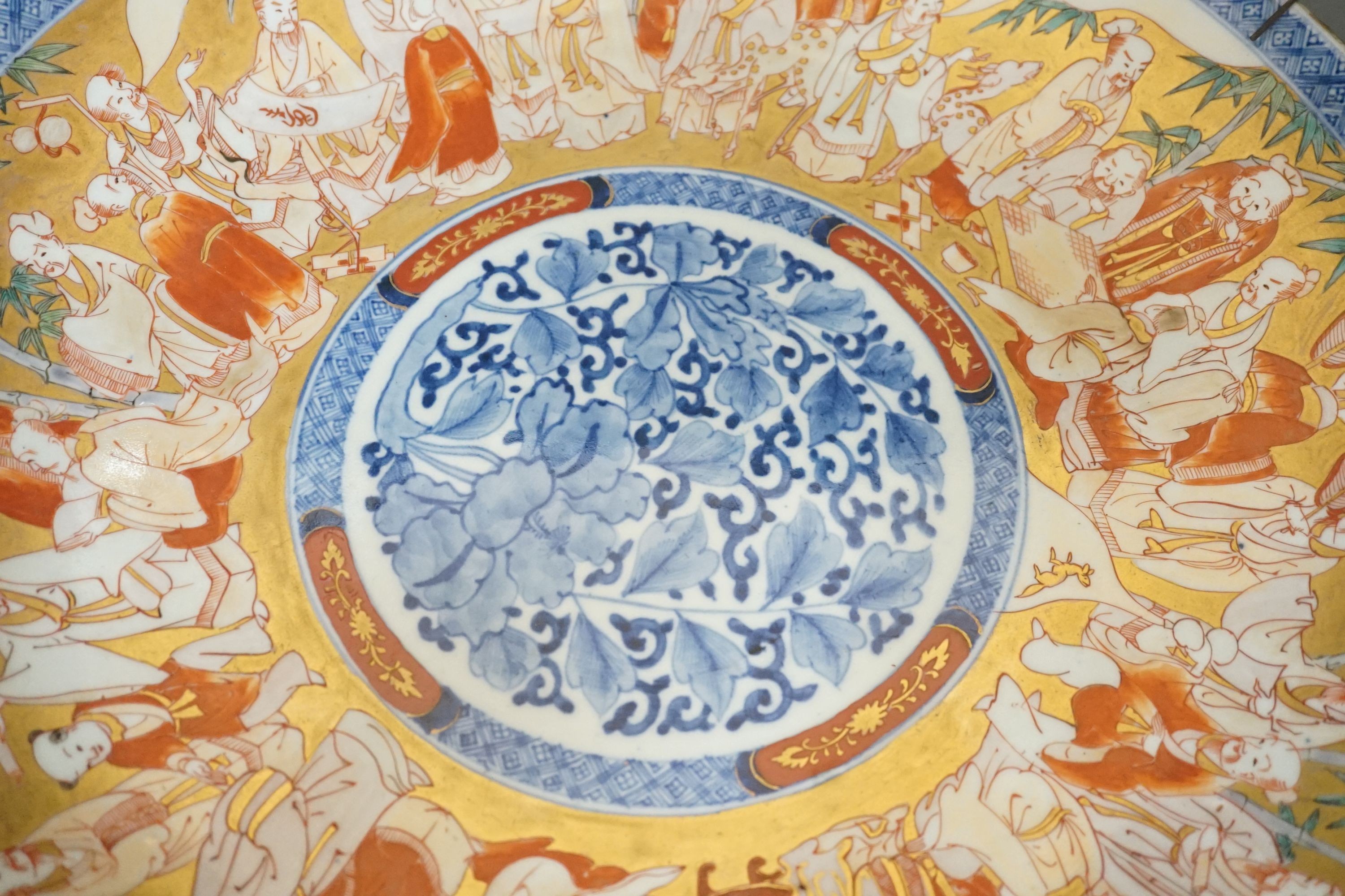 A large Japanese Imari ‘immortals’ dish - 46cm diameter